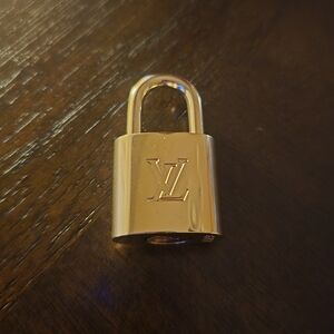 NWOT LOUIS VUITTON KEY AND LOCK